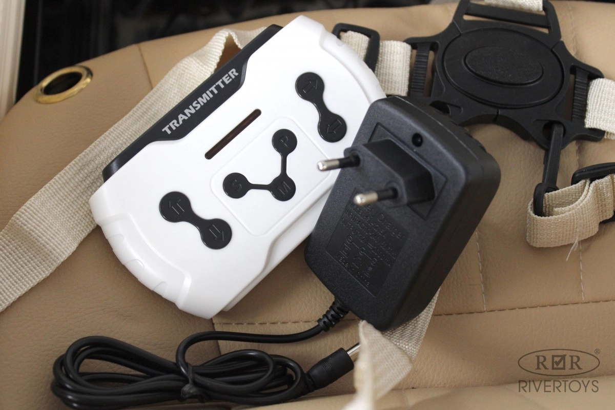 Детский электромобиль RiverToys X005XX черно-розовый ptekj8ekf02q0vrfc54yw4ai3jk2cmyl